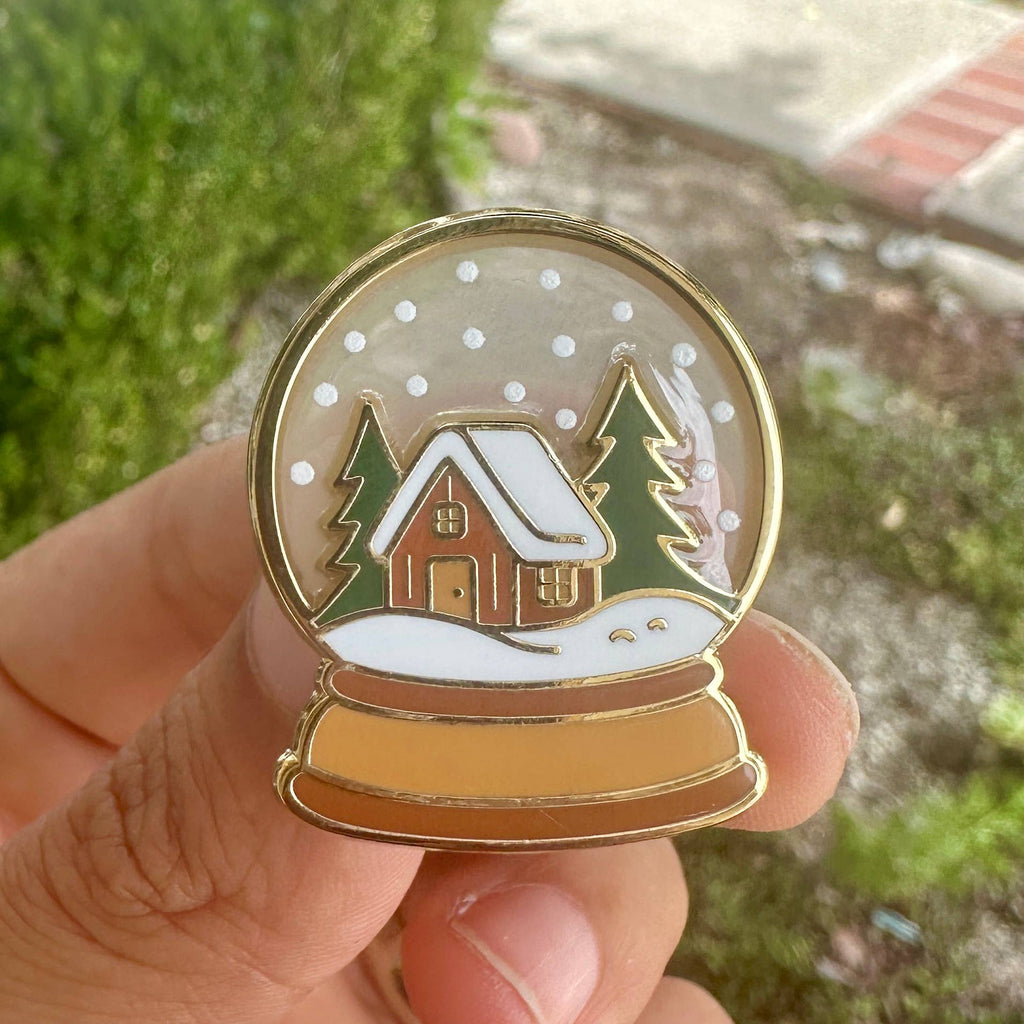 Snow Globe Enamel Pin with Cozy Cabin Winter Holiday Lapel