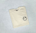 Embroidered Pocket Tee – Smiley Face with Heart Eyes