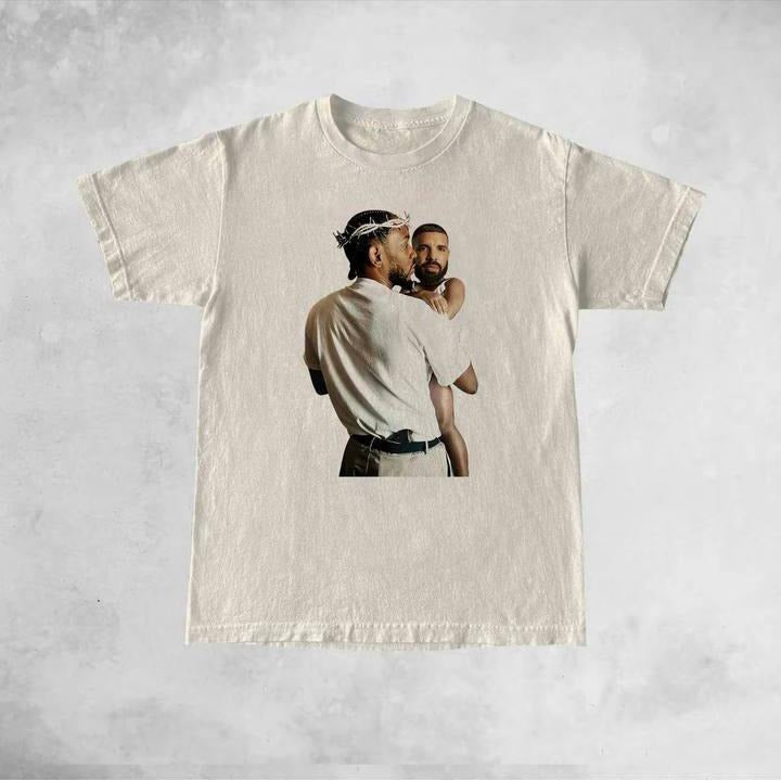 Kendrick Lamar Holding Baby Drake Shirt Kendrick Lamar Vs Drake Rap Beef Shirt Not Like Us Trending Shirt Funny Shirt T-Shirts