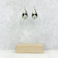 Silver Hilton Earrings T-Shirts