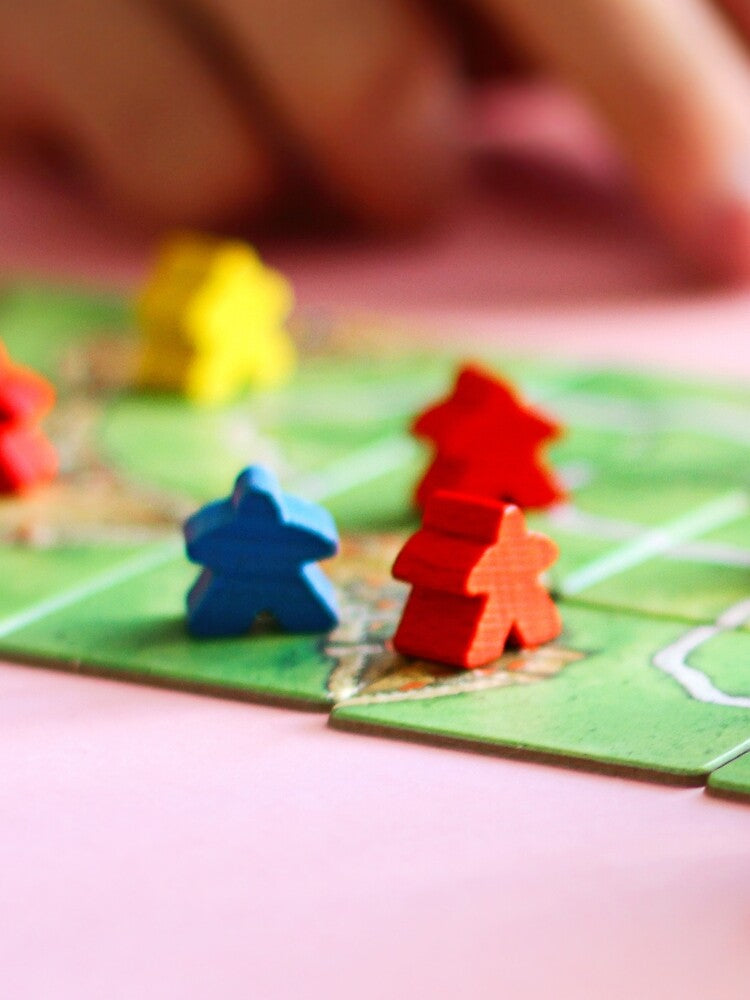 Carcassonne board game Meeple Photo by BeamGeeks