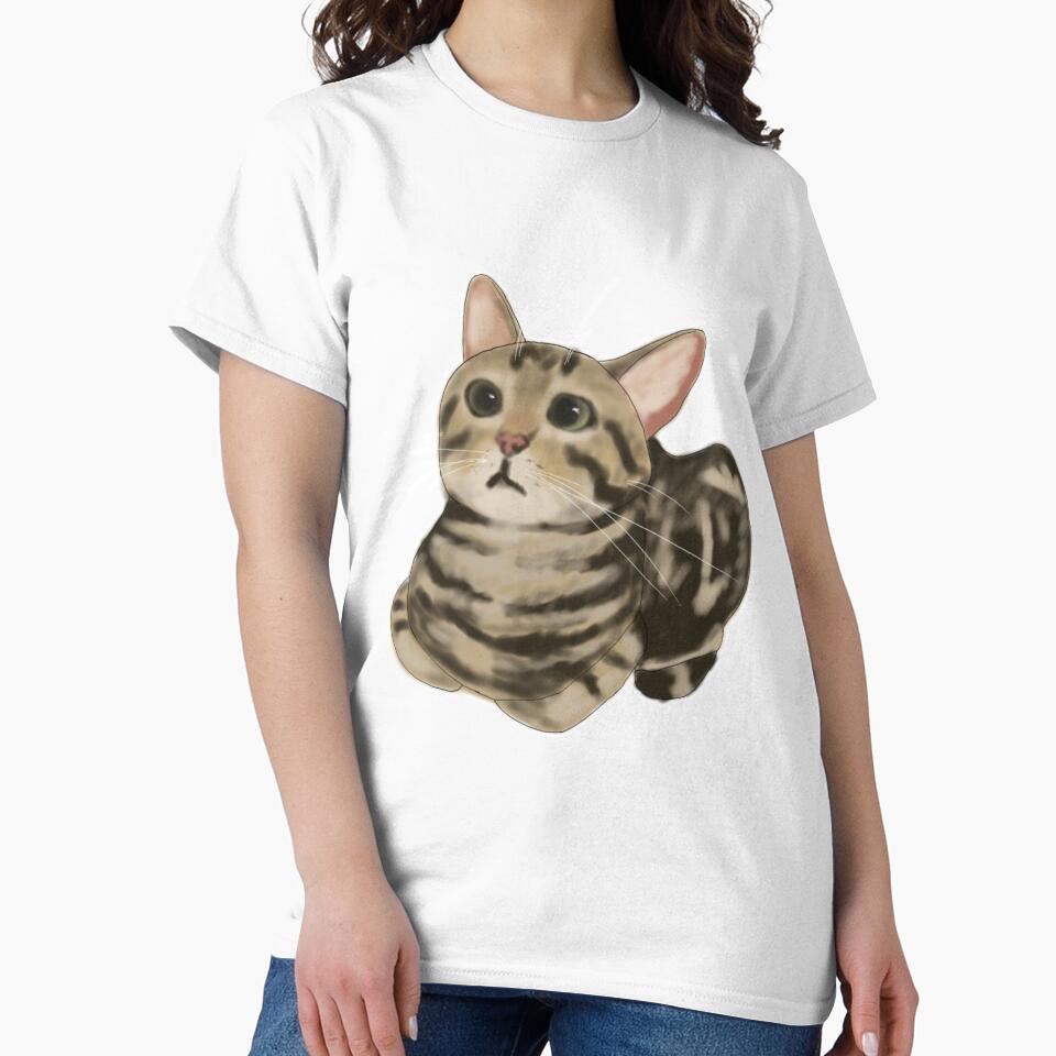 Brown tabby cat loafing by CreationsByBear