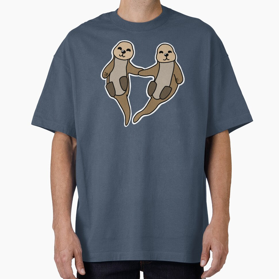 Otters Holding Hands In A Heart by BundaBear