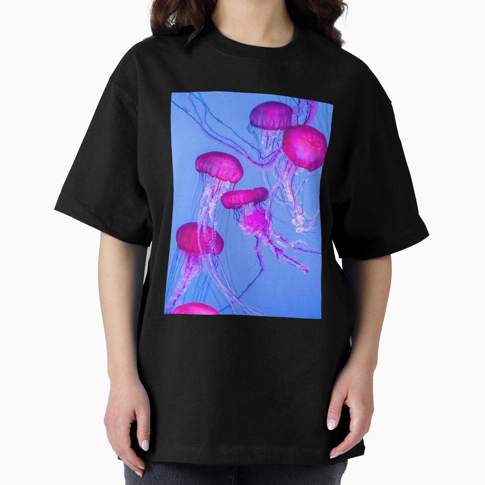 Mesmerizing Pink Jellyfish in Blue Glow by Bentenya
