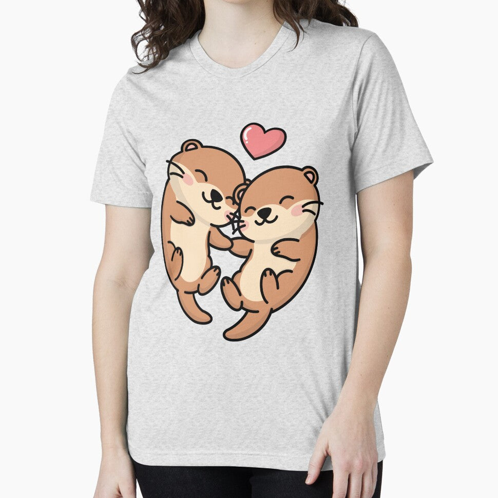 Two Otters Holding Hands With Heart by IN Tales