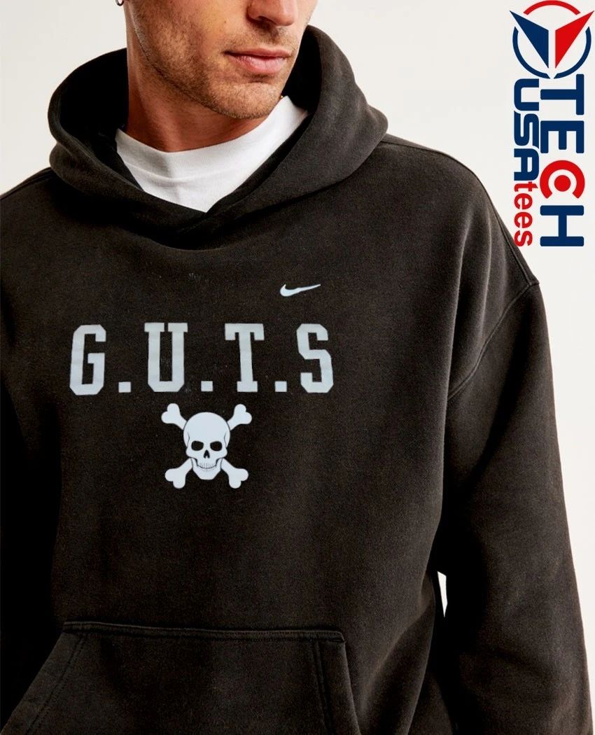 Eddie George wearing G.U.T.S. skull shirt
